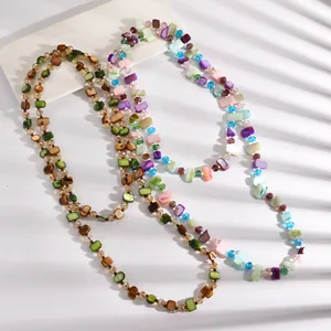 Detailed view of vintage Maillard style shell beaded necklaces ideal for layering outfits