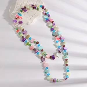 Detailed macro view of the vintage colorful shell and crystal beaded layered necklace