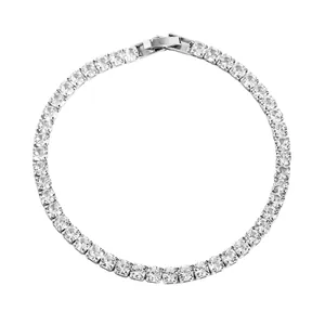 Macro view of a luxurious silver tennis bracelet decorated with square brilliant stones