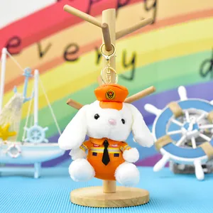 Schattige pluchen konijn sleutelhanger in oranje brandweeruniform met gouden clip