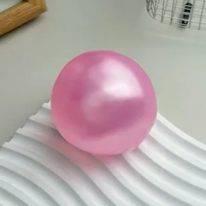 Pink handmade spherical squishy soap toy for stress relief