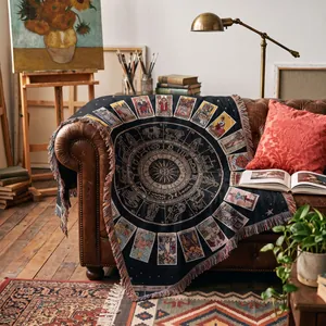 Intricate woven texture and tarot card details on a bohemian style throw blanket