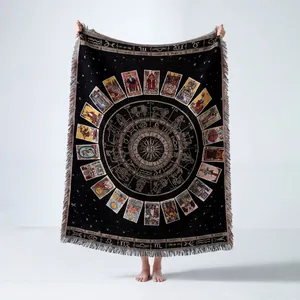 Large woven Bohemian blanket featuring tarot and zodiac motifs with fringe details
