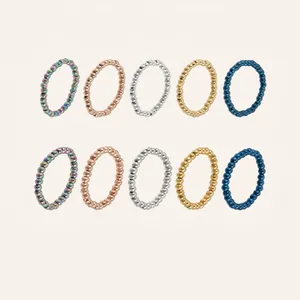 Set of 10 colorful stainless steel beaded elastic bracelets in various metallic finishes
