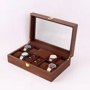 Detailopname van vintage houten horlogedoos met glazen deksel en fluwelen voering