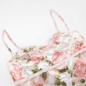 Detailed macro view of French floral satin dress featuring lace trim and underwire cups