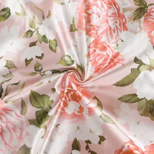 Macro view of silky satin fabric with delicate floral print and smooth sheen