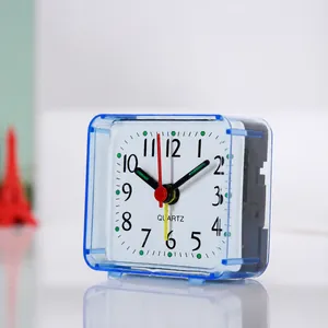 Macro view of a minimalist blue square quartz alarm clock for a kids bedside table