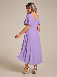 Back view of a plus size lilac chiffon dress with flutter sleeves and V-neckline