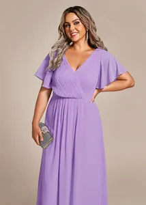 Detailed view of lavender chiffon plus-size dress with ruffle sleeves and V-neckline