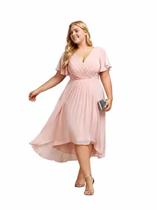 Elegant plus size pink chiffon evening dress with V-neck and high-low hemline on model