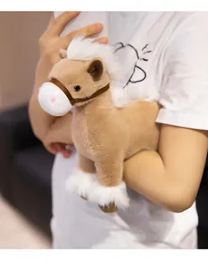 Cute brown simulation plush horse toy held in hands showing its soft texture and size