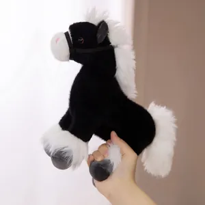 Soft black and white plush Russian war horse pony toy with fluffy white mane and tail