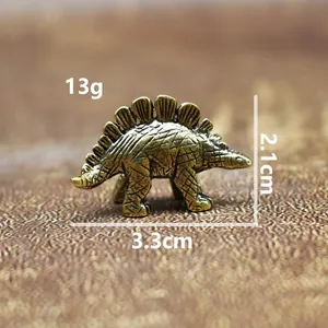 Detailed view of vintage brass stegosaurus figurine showing 13g weight and size dimensions