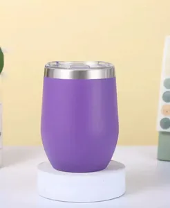 Purple 12oz stainless steel eggshell tumbler displayed on a white marble pedestal.