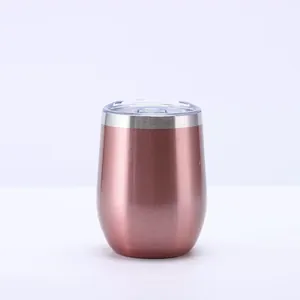 Detail of a 12oz rose gold stainless steel egg-shaped insulated wine tumbler with clear lid