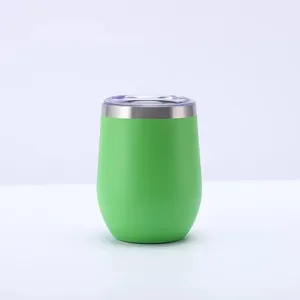 Detail view of a 12oz green stainless steel insulated eggshell tumbler with a clear lid