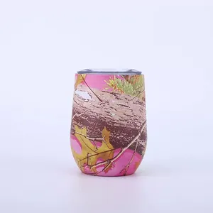 Detailed view of 12oz stainless steel eggshell wine tumbler with pink camouflage tree pattern