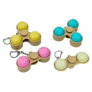 Bun-shaped light-up fidget spinner keychain set with mechanical buttons for stress relief
