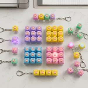 Collection de jouets fidget lumineux en forme de patte de chat macaron colorés