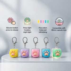 Set di 5 portachiavi antistress a zampa di gatto in silicone luminoso colori macaron.