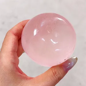 Pelota antiestrés rosa traslúcida de rebote lento para relajarse