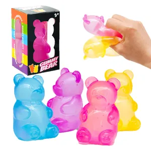 Close-up of colorful Gummy Bear squishy toys showing soft texture and retail box