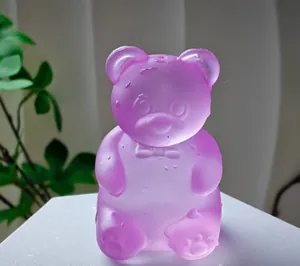 Purple gummy bear-shaped maltose stress ball toy with a translucent frosted texture