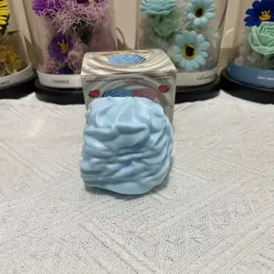 Close-up of a blue cream-shaped squishy toy for stress relief and relaxation