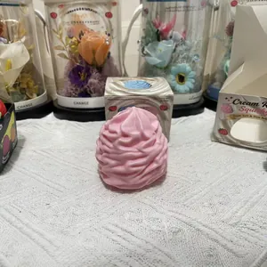 Detailed view of pink cream swirl slow rebound squishy toy with its gift packaging box