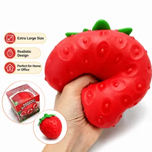 Giant strawberry slow rising squishy toy for stress relief with realistic texture and box.