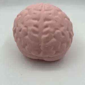 Detailed view of a pink brain-shaped slow rebound squeeze toy for stress relief and fun