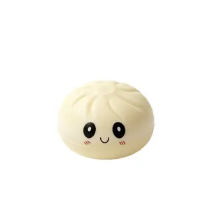 Niedliches lächelndes Dampfbrötchen-Squishy-Spielzeug aus PU-Slow-Rebound-Material