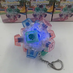 Vue détaillée du porte-clés balle anti-stress LED avec boutons colorés translucides