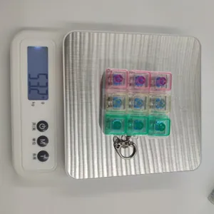 Mesure du poids de 53,2 g pour le porte-clés jouet mécanique à 9 touches pour le stress