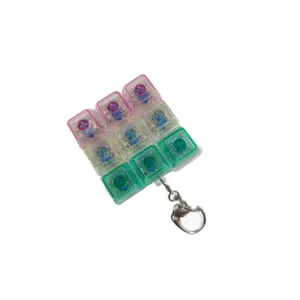 9-key colorful transparent mechanical switch fidget toy keychain with tactile feedback
