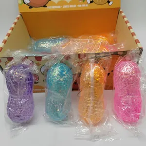 Four colorful peanut-shaped slow rebound squishy toys with glitter in individual packaging