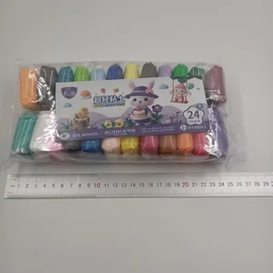 Detail view showing a 24-color non-toxic ultra-light clay set with a ruler for size