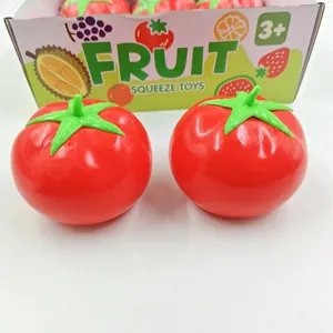 Realistic red tomato squeeze toys in packaging for stress relief and fun sensory play