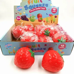 Close-up detail of realistic strawberry fruit squeeze stress relief toys in a 12-pack