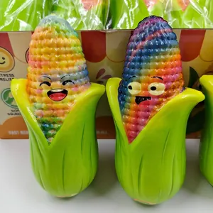 Detailed macro view of rainbow-colored PU slow-rebound corn squishy toys with funny expressions.