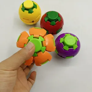 Detail of a transforming fidget spinner ball showing the mechanical expansion