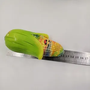 Detail shot of a colorful PU slow rebound corn squishy toy showing its size with a ruler