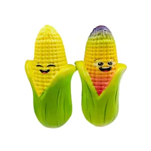 Two colorful slow rebound PU foam corn squishy toys with cute smiling faces for stress relief