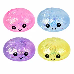 Set van 4 kleurrijke glitterbroodjes fidget toys met schattige lachende gezichtjes