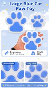 Giant cat paw squishy toy macro view showing smooth and flocked TPR textures.