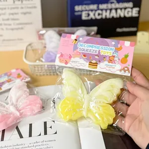 Close-up detail of a butterfly-shaped silicone squeeze toy in its original packaging
