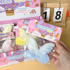 Close-up of a blue butterfly silicone stress relief toy in cute macaron packaging