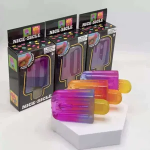 Close-up detail of colorful maltose popsicle squishy toys displayed on a white pedestal