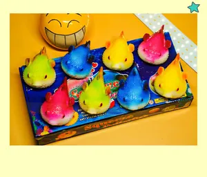 Close-up detail of various colorful squeeze pufferfish anti-stress toys on their packaging box